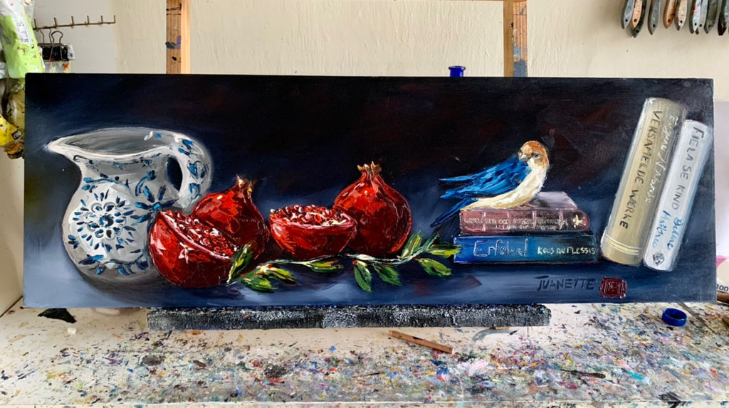 Stillife with books and pomegranates