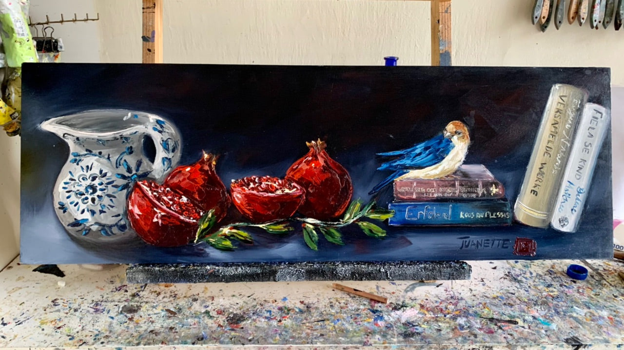 Stillife with books and pomegranates